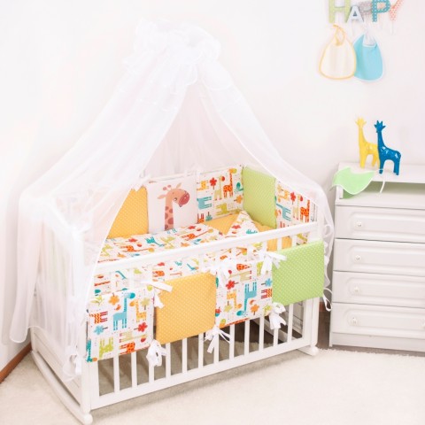 картинка Комплект в кроватку 18 предметов "Апельсиновый жираф" с подушечками от магазина Аистенок